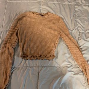 Cropped long sleeve top